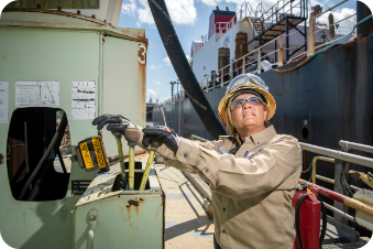 Dock operator preparing for a vessel transfer