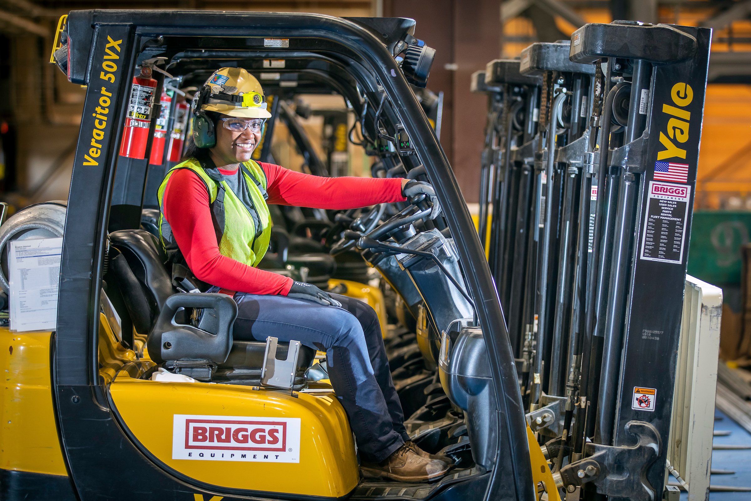 forklift operator in packaging warehouse